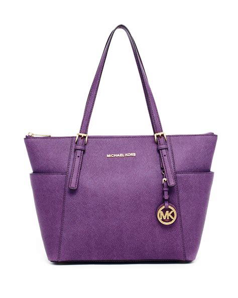 lavender michael kors purse.